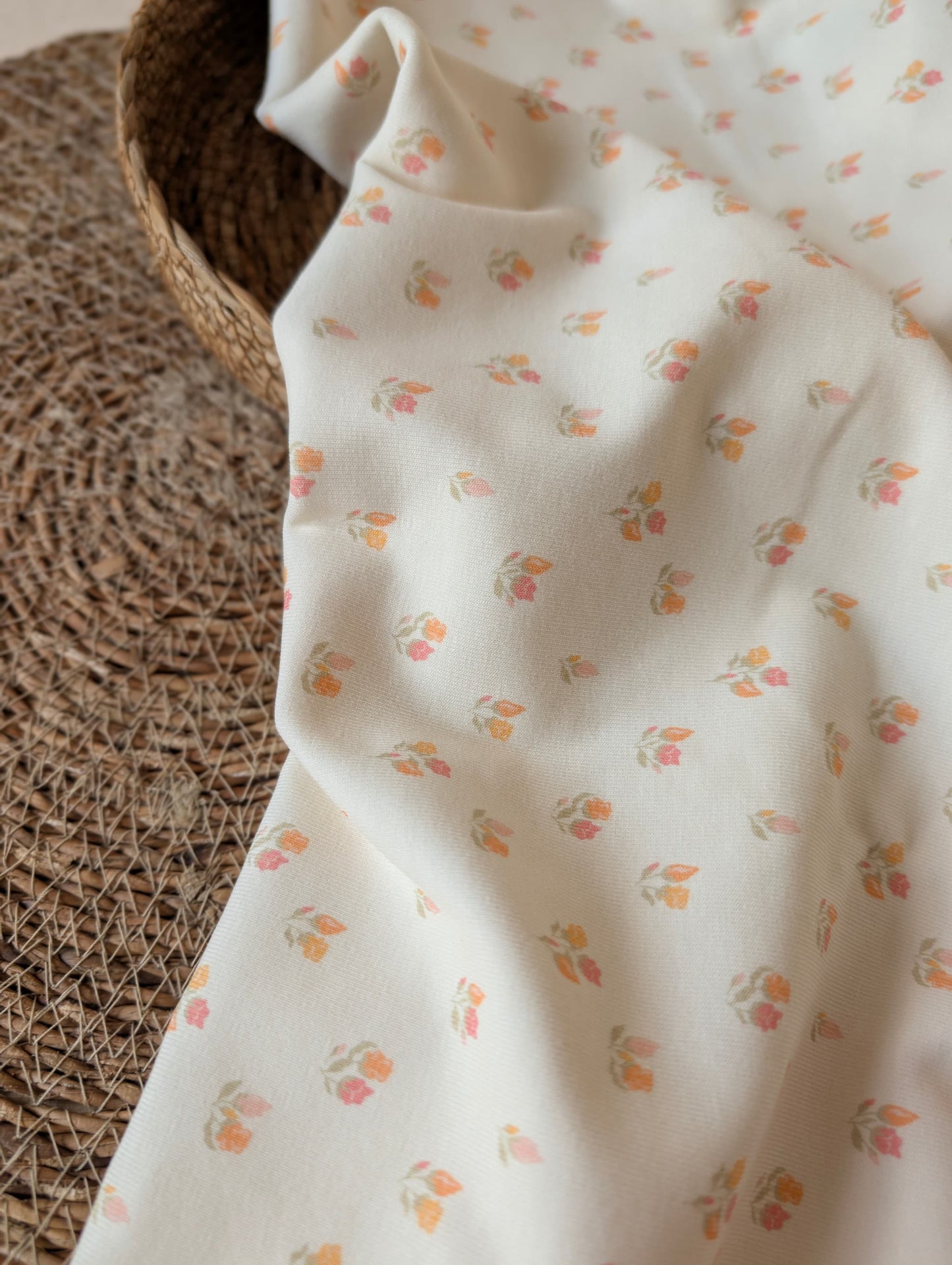 
Beatrice Floral Cotton Rib Pastel draped to show soft drape and rib texture — floral print in pastel tones on premium cotton elastane rib jersey — Esorai