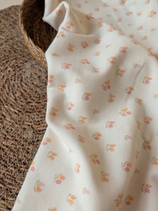 
Beatrice Floral Cotton Rib Pastel draped to show soft drape and rib texture — floral print in pastel tones on premium cotton elastane rib jersey — Esorai
