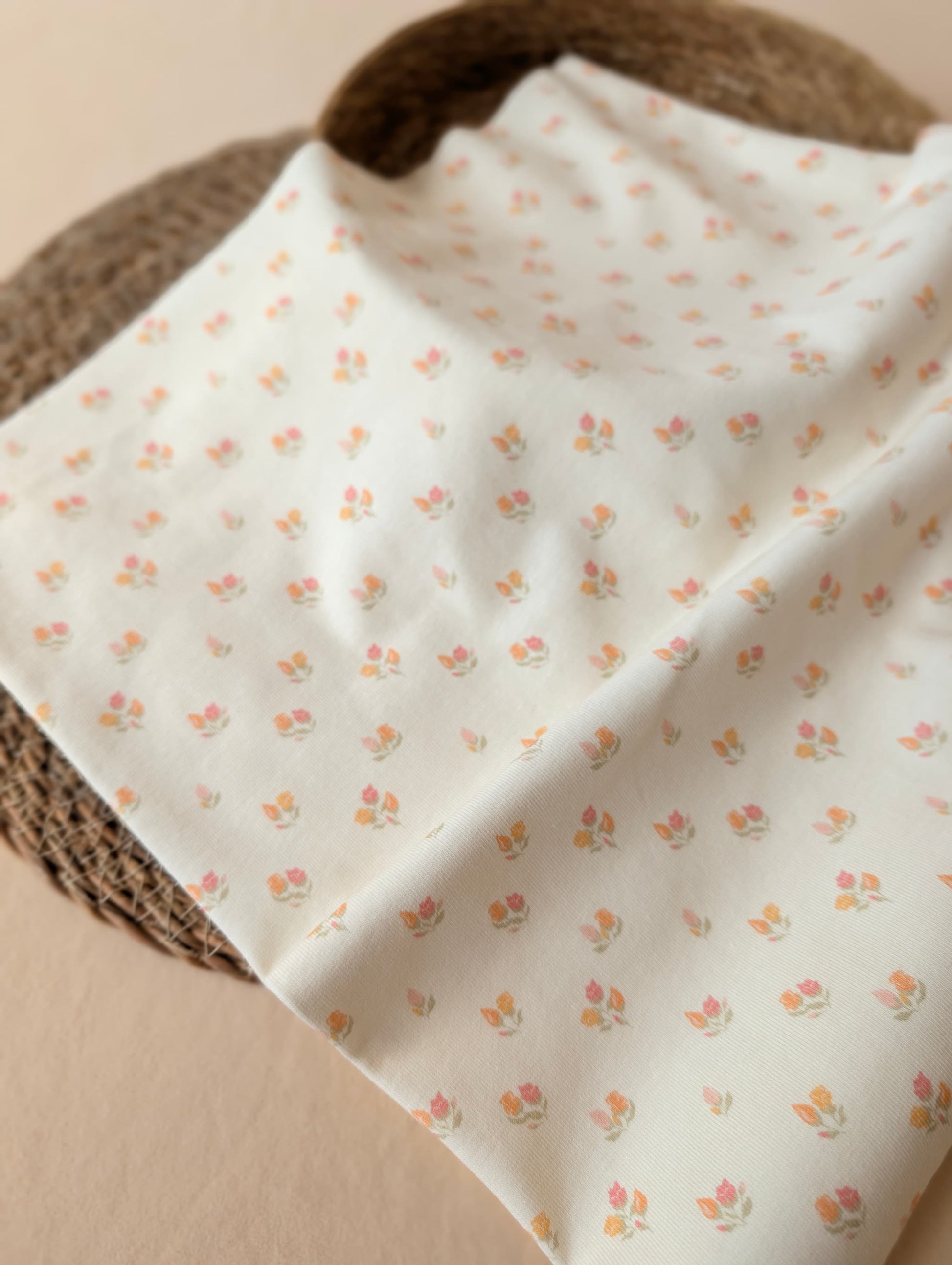 Close-up of Beatrice Floral Cotton Rib Pastel — delicate floral print detail on textured 1x1 cotton rib jersey in soft pastel tones — Esorai
