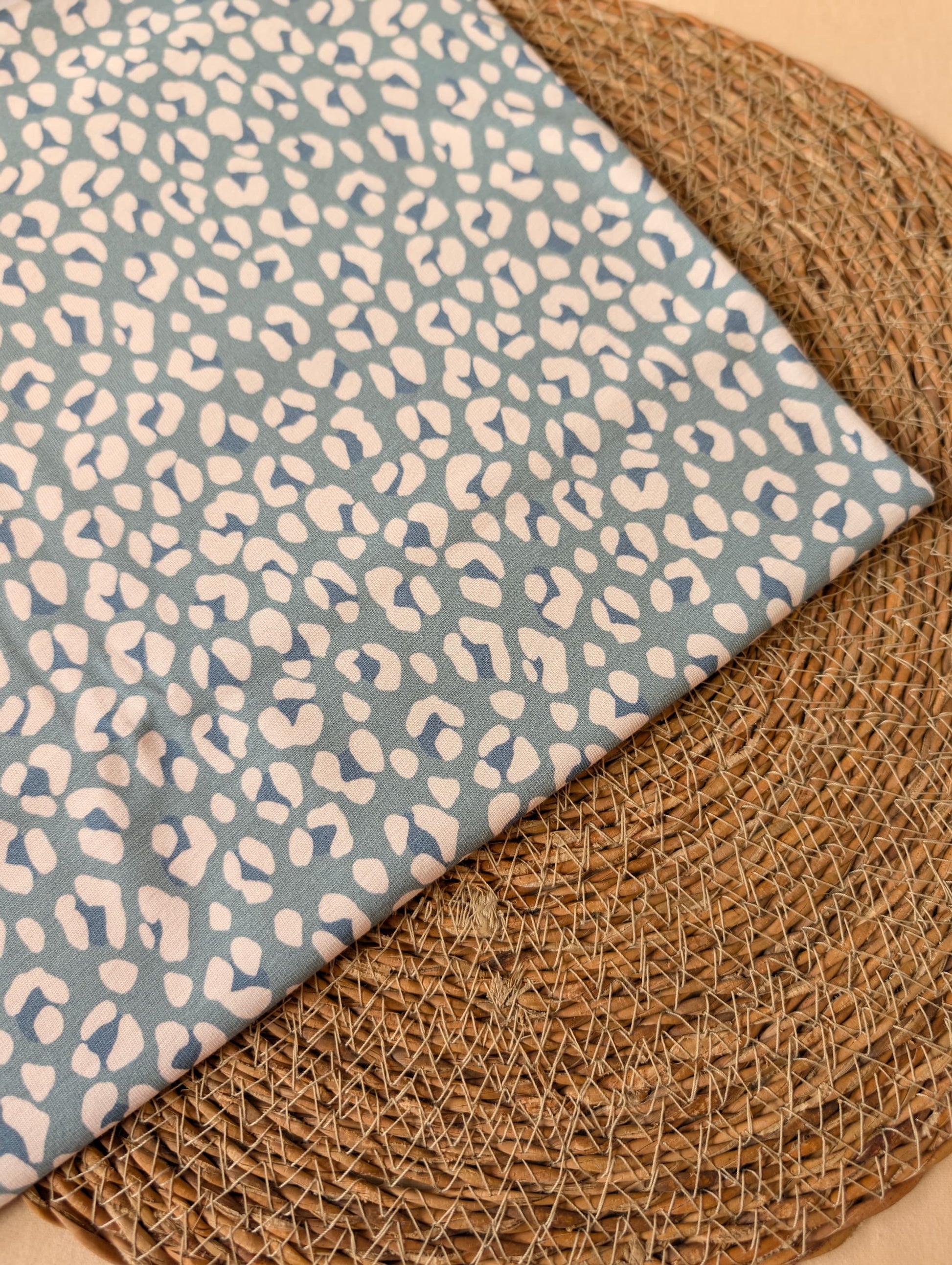 Close-up of Cleo Leopard Cotton Jersey Duck Egg — leopard print detail in soft blue tones on smooth cotton elastane jersey — Esorai
