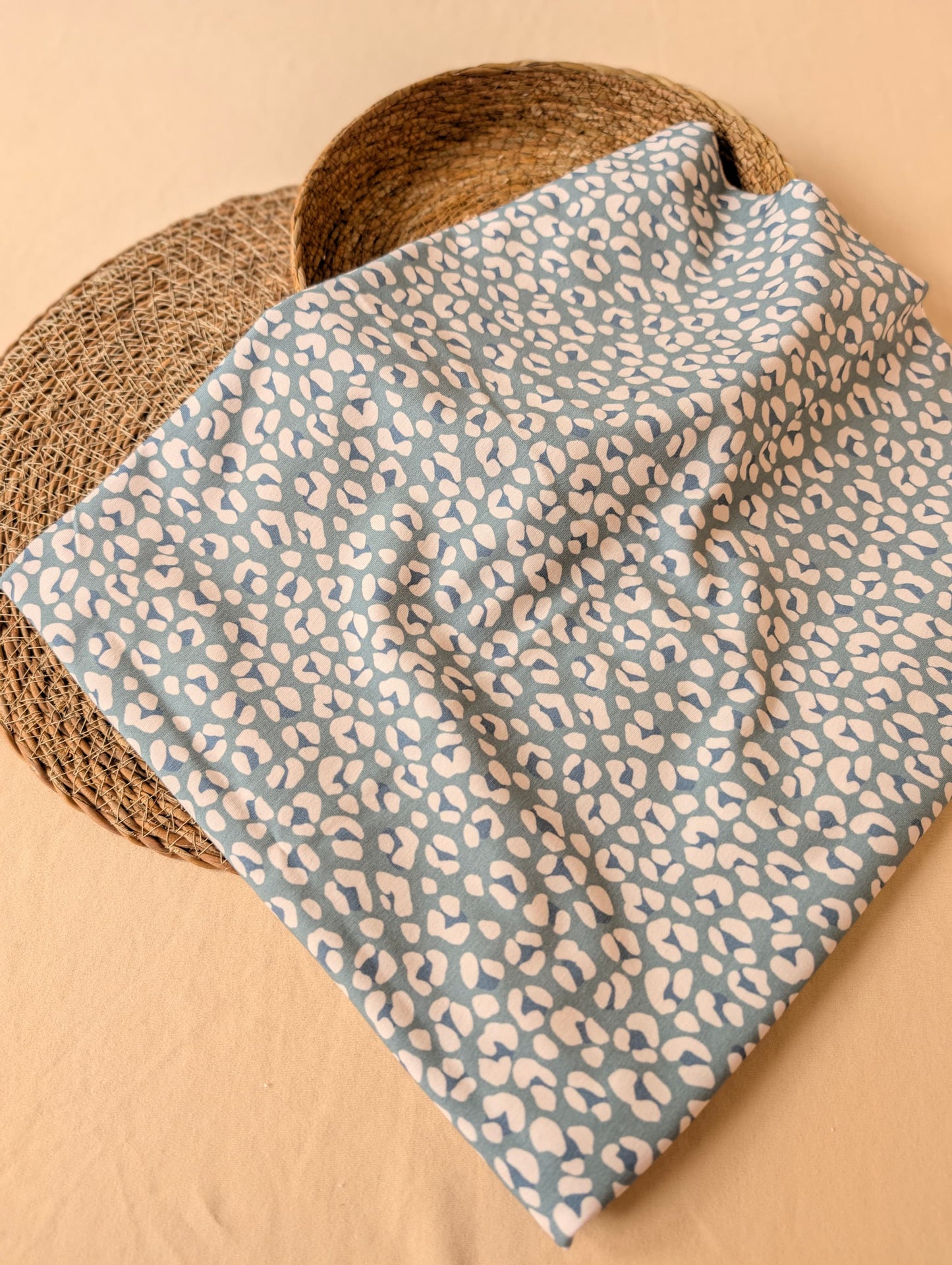 Cleo Leopard Cotton Jersey Duck Egg draped to show soft drape and stretch — leopard spot print in duck egg blue on premium cotton jersey — Esorai