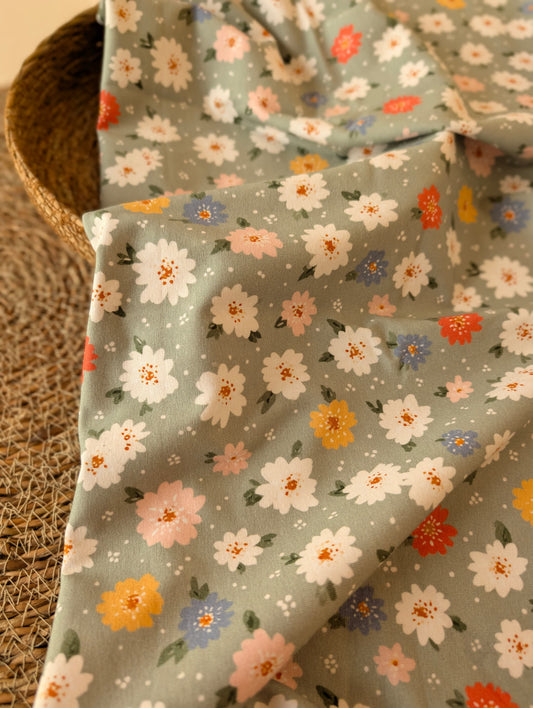 Daisy Floral Cotton Jersey Sage draped to show soft drape and stretch — floral daisy print on sage green cotton elastane jersey — Esorai
